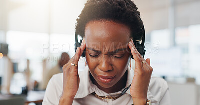Buy stock photo Frustrated, black woman and headache with headset in office for mistake or project deadline. Female person, consultant or agent with migraine or pain for overworked strain or pressure in call center