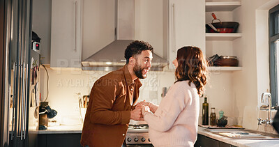 Buy stock photo Holding hands, dance or funny couple in kitchen for love, anniversary celebration or excited partner. Moving, woman and man in home with music, laugh and romantic rhythm for healthy relationship