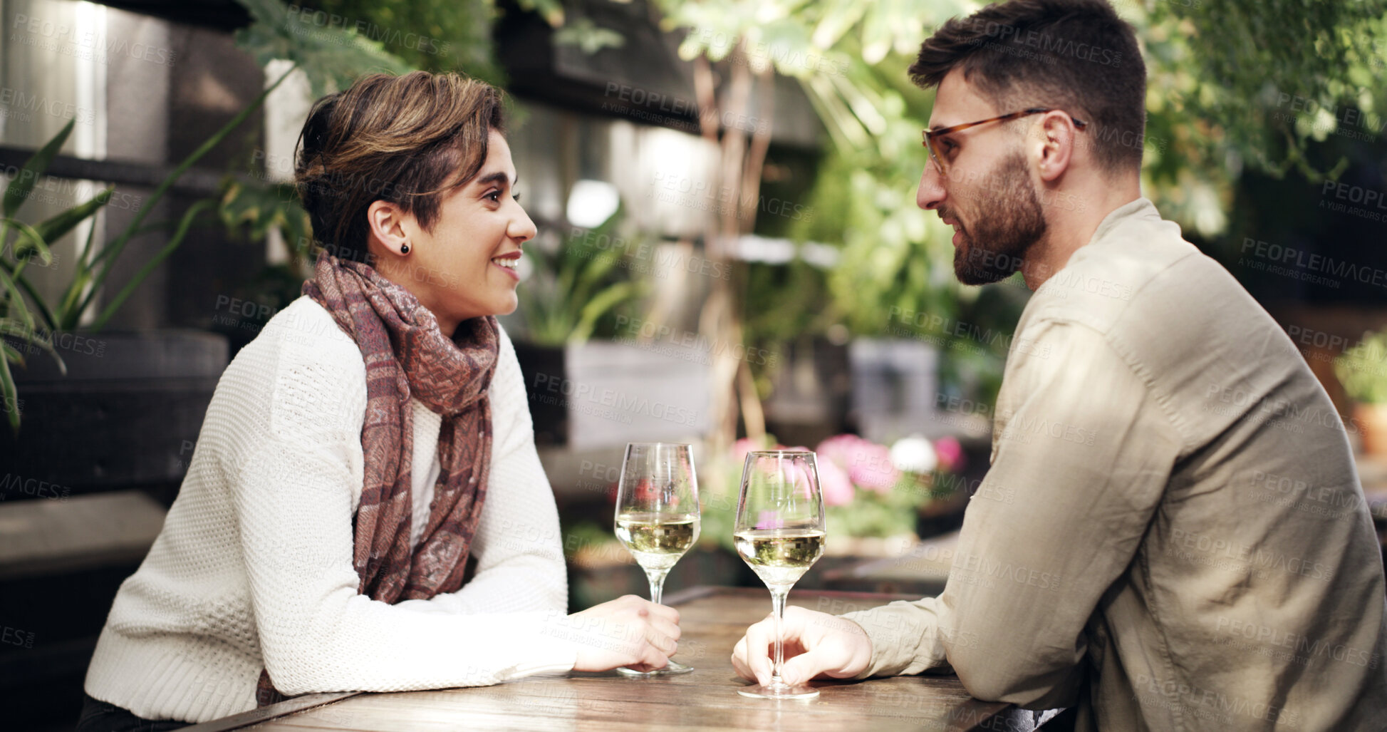Buy stock photo Love, smile or couple in restaurant with wine, connection or bonding together on anniversary. Happy, partner or people in bistro with drink, honeymoon or romantic date in healthy relationship.