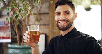 Buy stock photo Portrait, man and smile with alcohol at pub for happy hour, order and positive attitude. Confident, male person and glass with beer, cultural experience and whiskey beverage at hospitality industry
