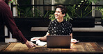 Laptop, discussion and businesswoman with manager in office for feedback or review on creative project. Computer, conversation and magazine editor with employee for planning publishing at agency.