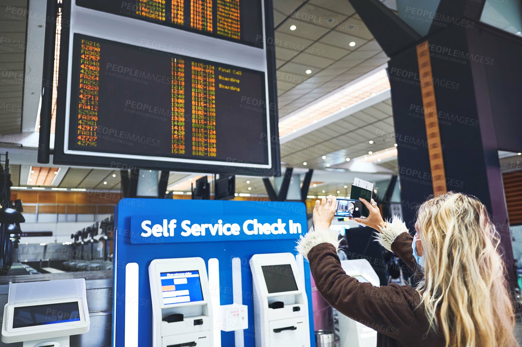 Buy stock photo Woman, photo and phone screen with flight info at airport for travel schedule, gate number or mask. Passport, person and mobile picture of airline display for departure, immigration and boarding time