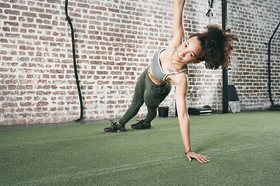 Buy stock photo Side plank, sports and portrait of woman in gym with exercise, training or wellness routine. Health, strong and female athlete with core strength workout, challenge or active in fitness center.