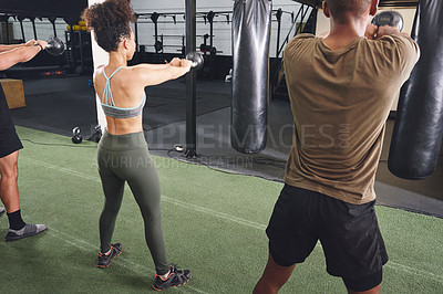 Buy stock photo Fitness, class and back of people with kettlebell for workout, muscle strength and exercise. Sports, health club and men and woman with gym weights for bodybuilder training, challenge and strong arms