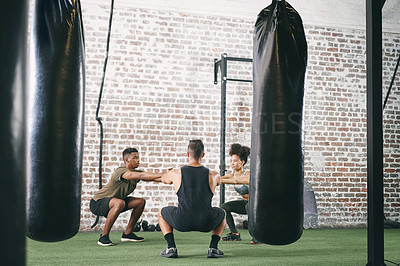 Buy stock photo Squat, fitness and group of people in gym for exercise, bodybuilder training and core workout. Sports center, instructor and men with woman with warm up for muscles, balance and strength for health