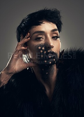 Buy stock photo Makeup, creative and portrait of woman with stars in studio for artistic design, face paint and cosmetics. Beauty, salon and person with dark aesthetic, glow and self expression on gray background