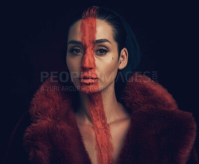 Buy stock photo Portrait, woman and makeup with face paint in studio for culture, sacred and tribal identity. Serious, female person and artistic symbol for resistance, tradition and expression on black background