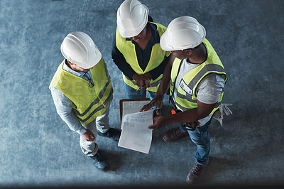 Buy stock photo Above, architecture and people with blueprints, planning for project and inspection. Construction site, man and woman with documents, engineering or checklist for building development and renovation