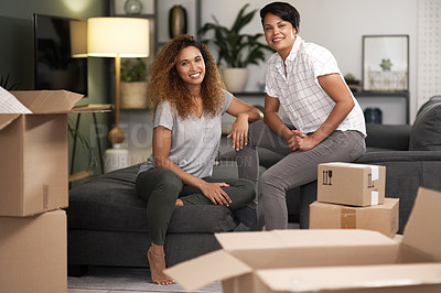 Buy stock photo Boxes, new home and portrait of lesbian couple in bedroom together for growth, love or mortgage. Moving house, property and smile of gay women in apartment for bonding or real estate investment