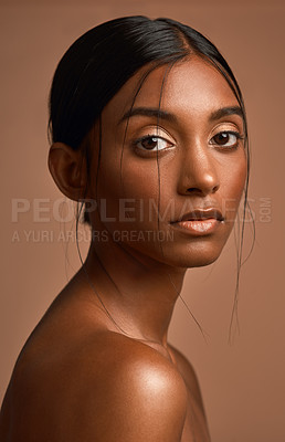 Buy stock photo Portrait, skincare and woman with natural beauty in studio, aesthetic and shine for wellness. Cosmetics, serious person and glow for self care, skin health or dermatology with texture on background