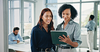 Buy stock photo Meeting, talking and business women on tablet for feedback, project review and budget planning. Office, teamwork and workers on digital tech for research, discussion and finance report for campaign