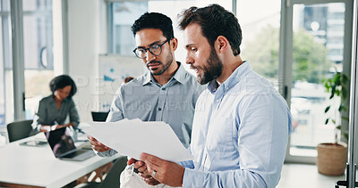 Buy stock photo Documents, reading and teamwork with business people in meeting for acquisition, finance advisor and liquidity. Brainstorming, research and report with employees in corporate firm for partnership