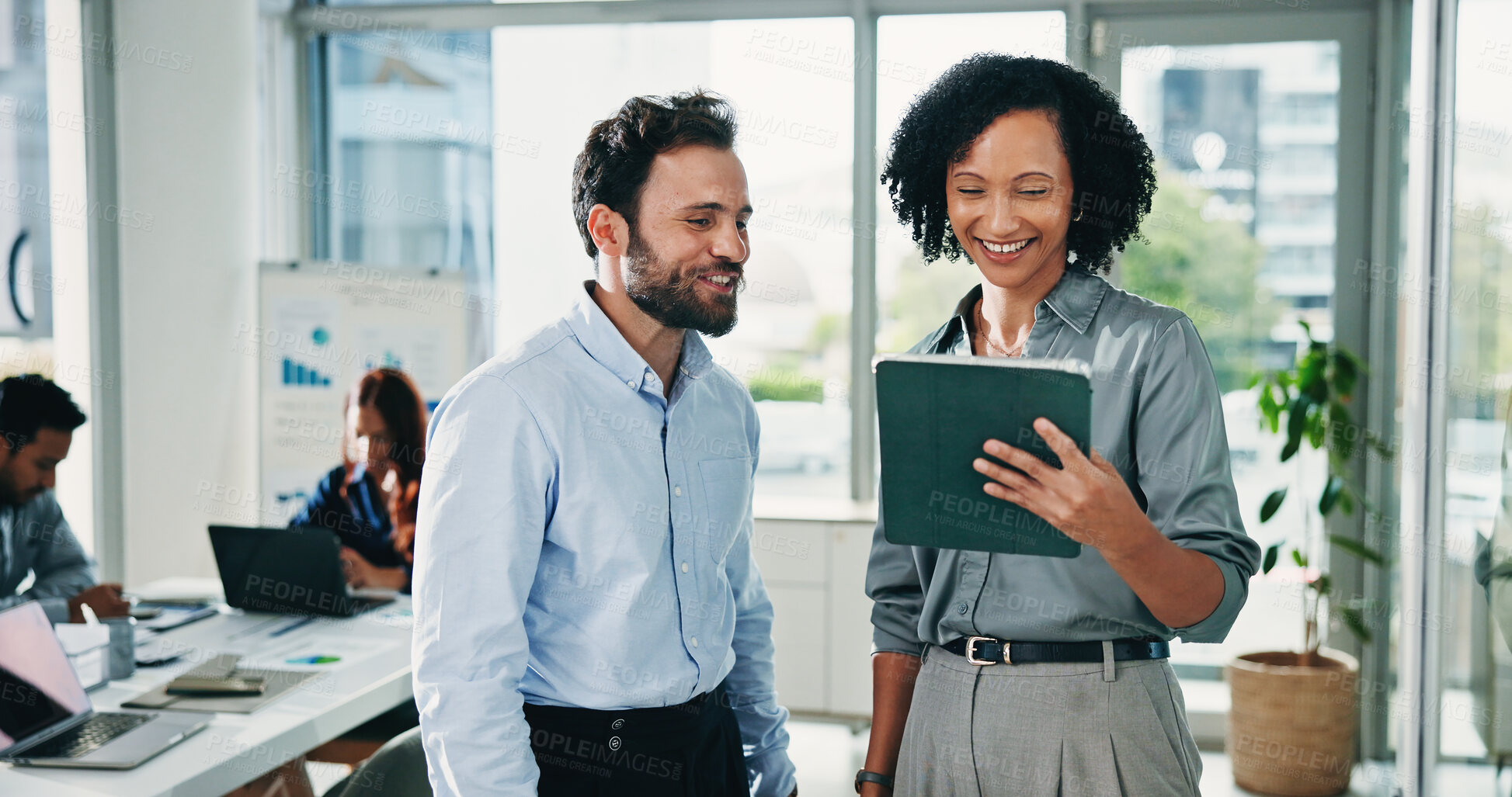 Buy stock photo Happy woman, man and planning with tablet at office for review, insight or notes at insurance company. People, broker and advisor on app, team and tech for project report at risk management agency