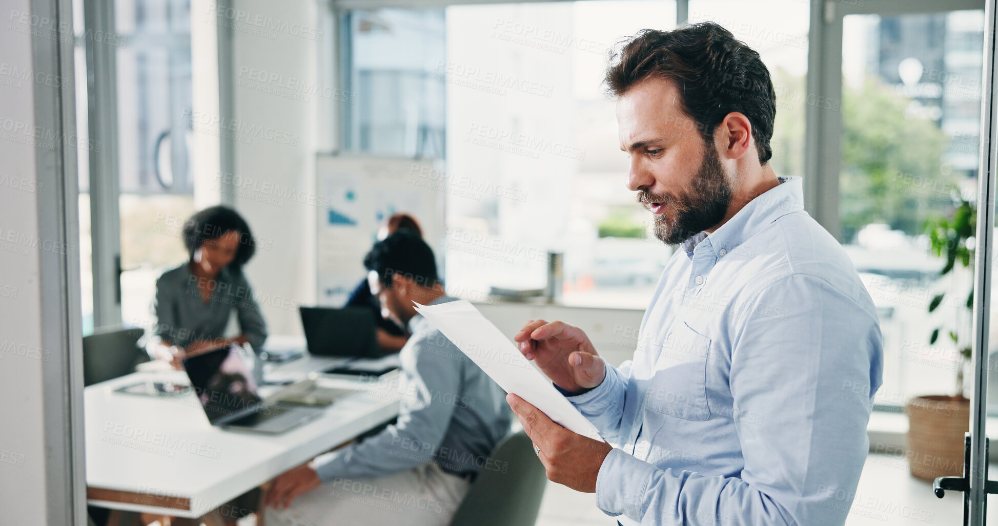 Buy stock photo Documents, reading and research with business man in office for acquisition, finance advisor and liquidity. Brainstorming, review and report with employees in corporate firm for investment trader