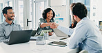 Happy, business people and meeting with handshake for teamwork or partnership together in office. Group, colleagues or employees shaking hands with smile for onboarding, deal or company agreement