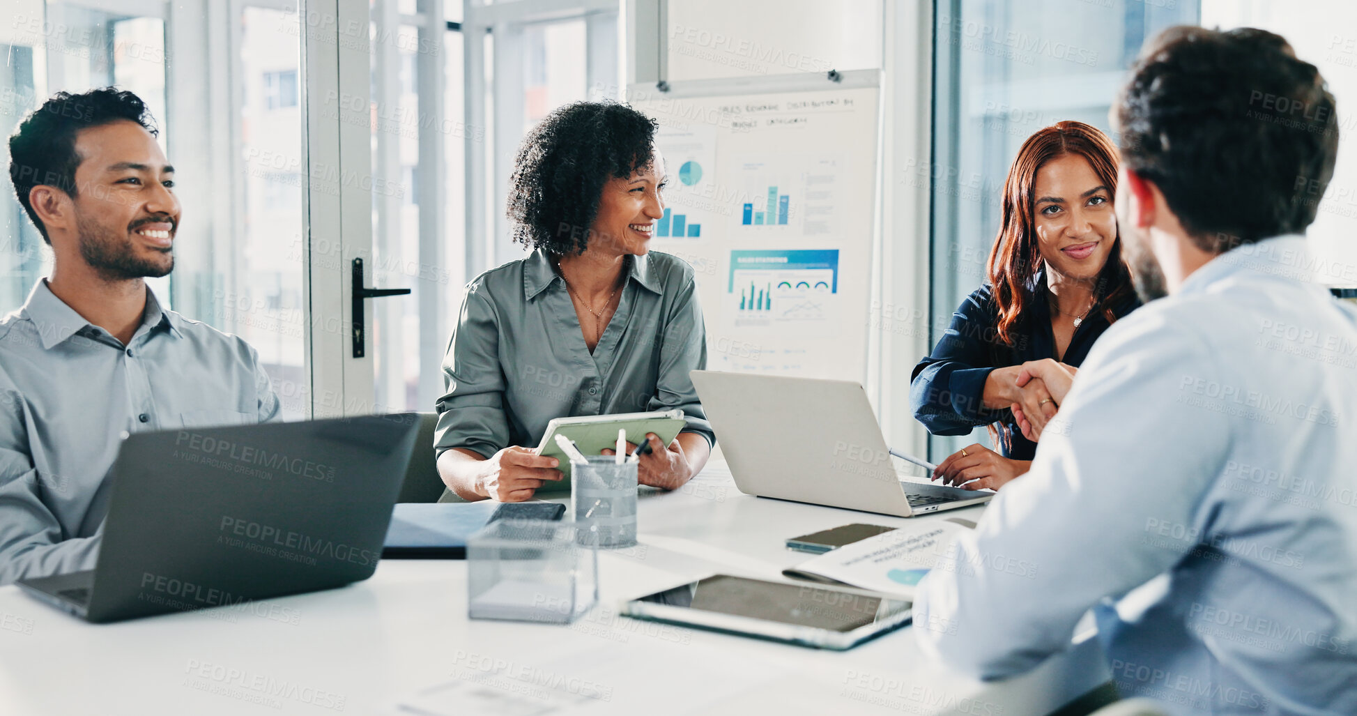 Buy stock photo Happy woman, man and handshake with smile at office meeting for deal, thanks and laptop at insurance company. People, staff and shaking hands with team, success and goals at risk management agency
