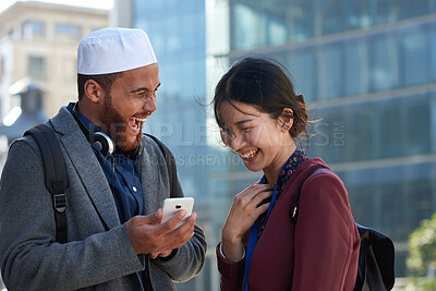 Buy stock photo Employees, funny and people in city, smartphone for social media and laughing with communication. Outdoor, professionals or online humor with discussion, joke and cellphone for website info or smile