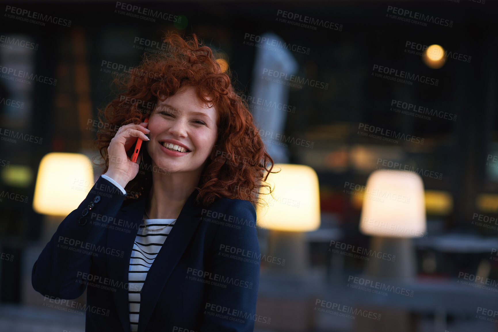 Buy stock photo Phone call, night and happy woman in city, talking and digital app for communication. Funny, evening and person in street, smartphone and connection for chatting, humor and discussion with joke