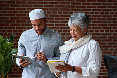 Buy stock photo Creative, people and meeting with tablet in office for research, planning or copywriting report. Team, review or digital with notebook for feedback, fact check and writing notes for story publication