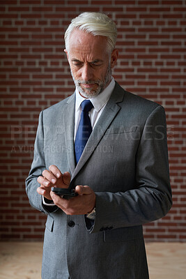 Buy stock photo Business, investor and man in office, smartphone for online trading platform and social media. Mature person, connection and financial advisor in workplace, cellphone for economy info and investment