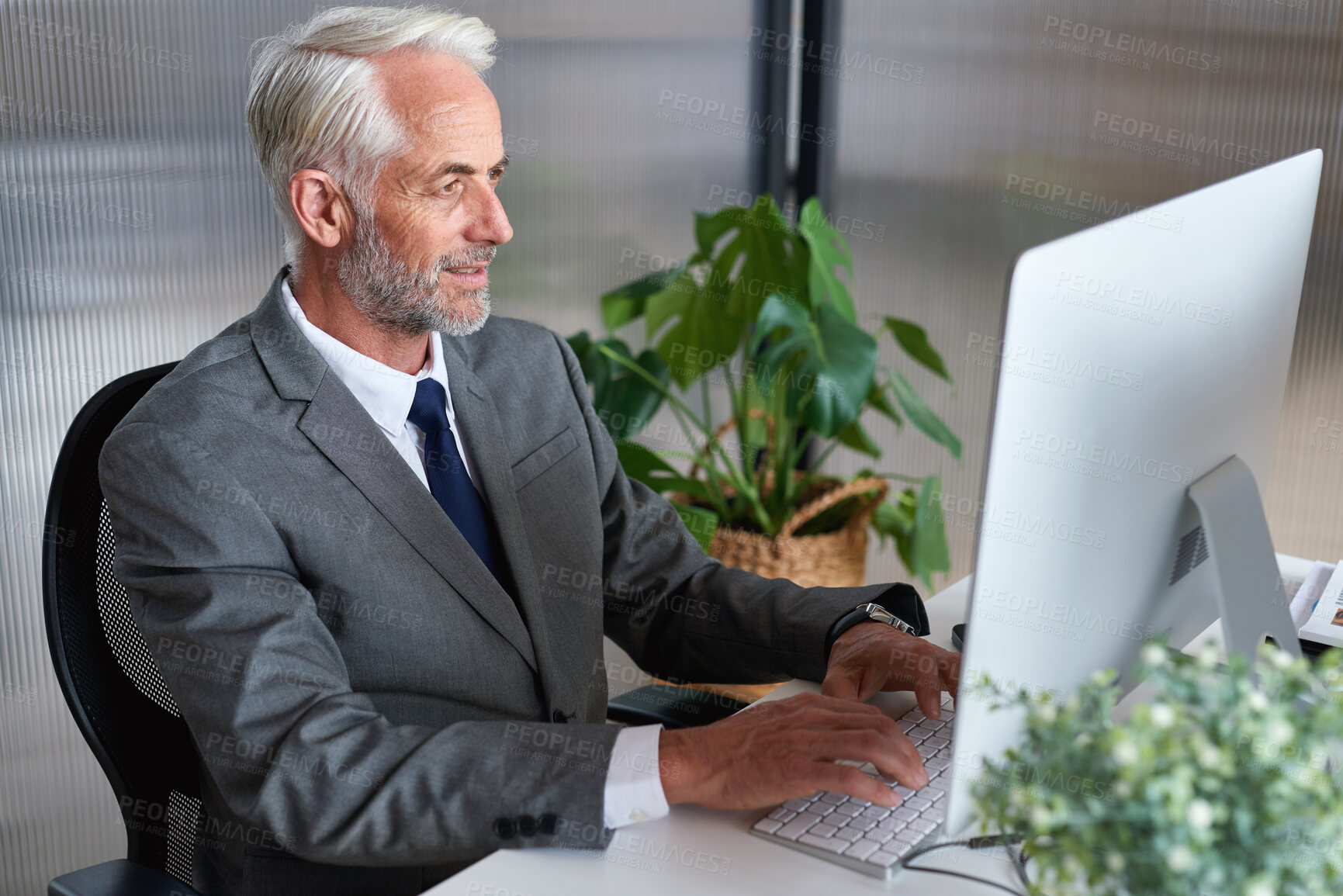 Buy stock photo Business, lawyer and man in office, computer or research for legal case, corporate policy or website info. Mature person, employee or attorney in workplace, pc or email for justice review or typing