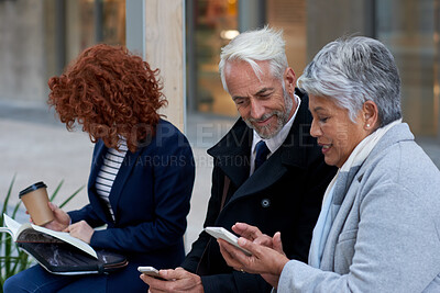 Buy stock photo Employees, discussion and people in city, smartphone for social media or digital app with communication. Outdoor, professional or online reading with smile, talking and cellphone for website info