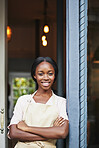 Hospitality, portrait or black woman at cafe with confidence, about us or owner of bistro business. Smile, entrance or restaurant manager with arms crossed, experience or pride in dining industry.