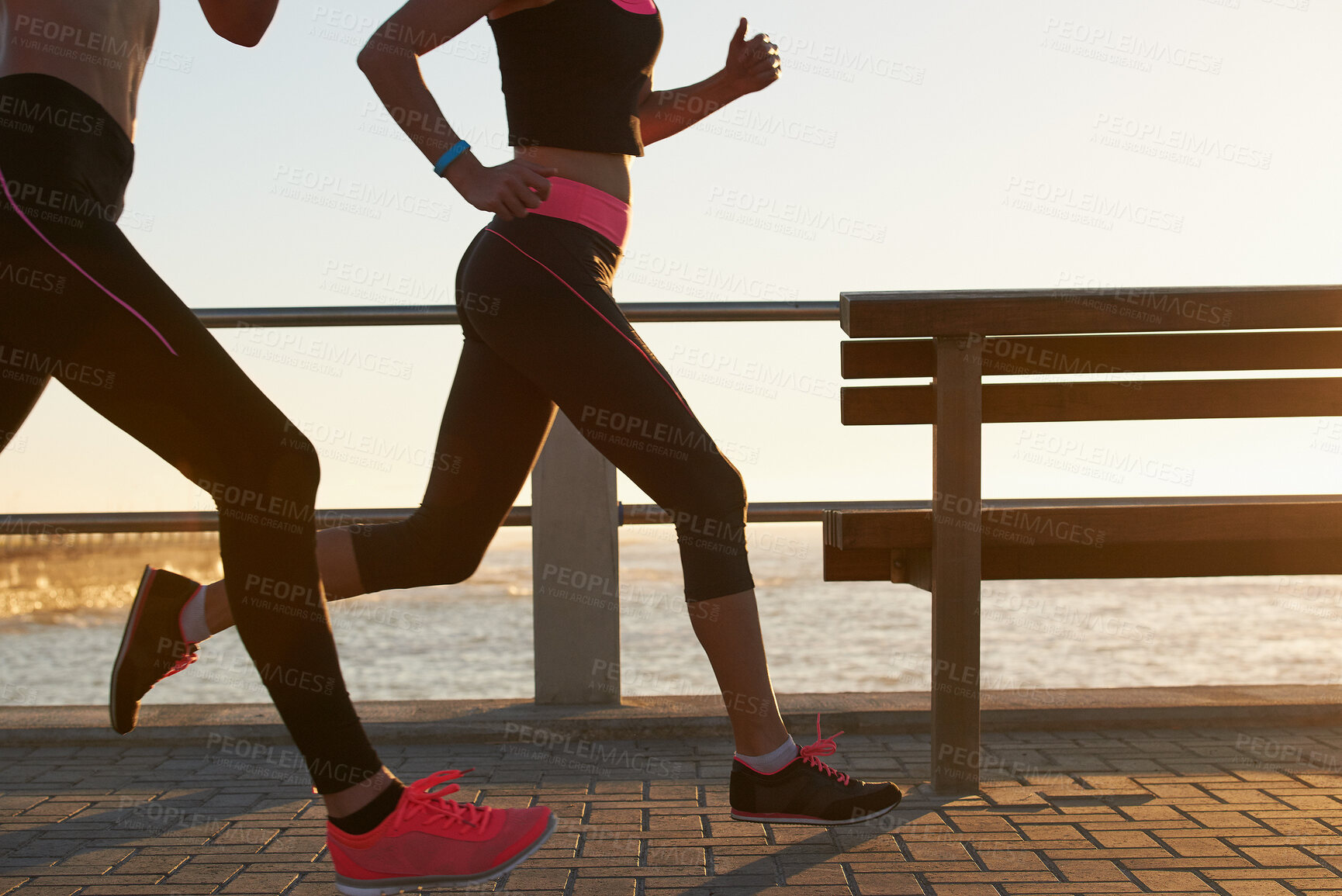 Buy stock photo Fitness, friends and legs on promenade with running, cardio or team exercise in physical activity. Collaboration, workout  or people outdoor with jog, stamina training and sports hobby in Australia.