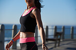 Close up of athletic body of woman runner outdoors