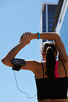 Runner woman in the city stretching