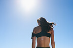 Stylised portrait of woman runner from behind