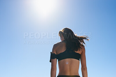 Buy stock photo Fitness, outdoor and back of woman for sports, exercise or active with wellness in summer. Runner, blue sky and female person in nature for cardio workout, training or health by mockup space.