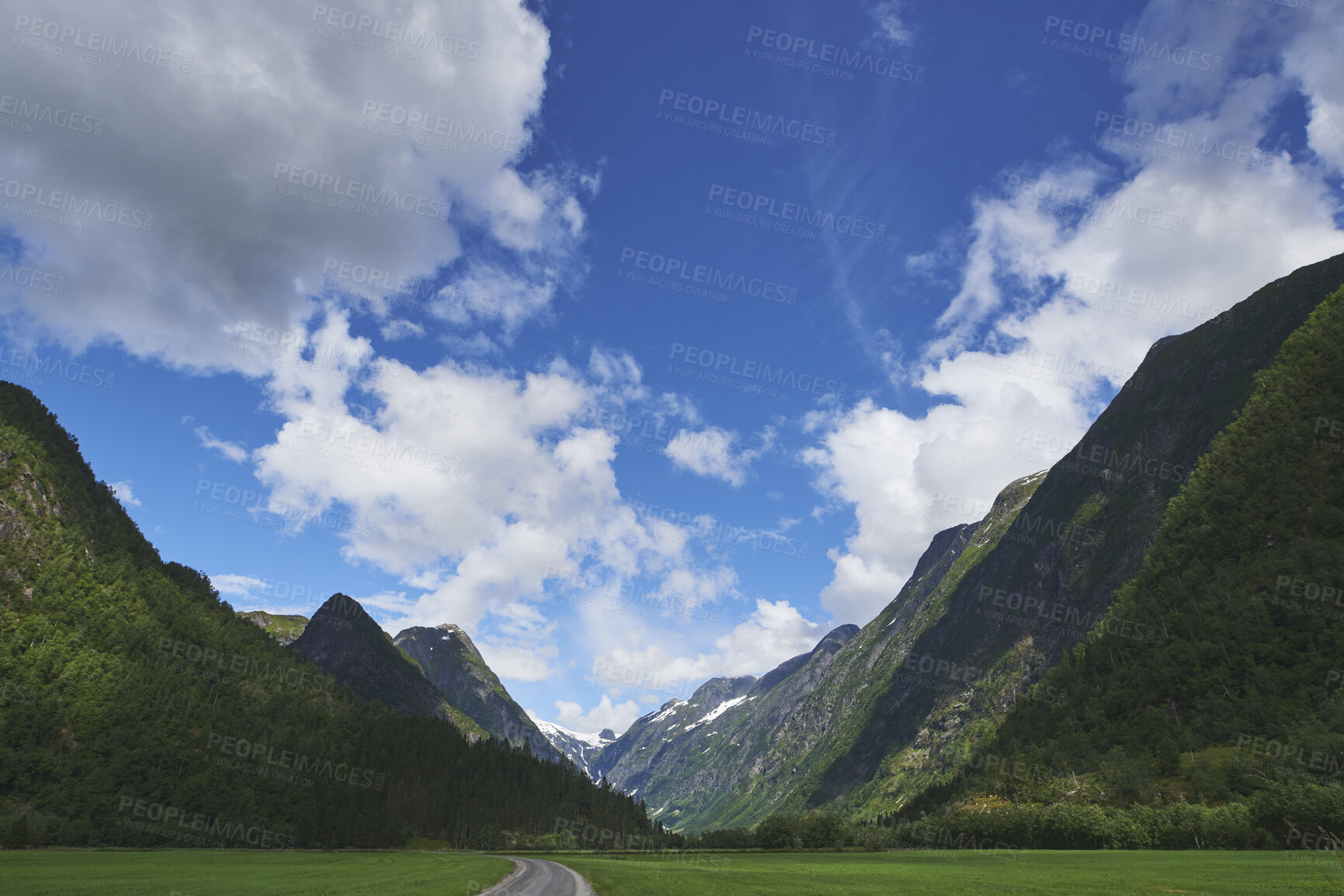 Buy stock photo Landscape, mountain and valley with road in nature for travel, adventure and path for holiday. Clouds, woods and outdoor journey with scenic route, tourist freeway and green foliage for vacation trip
