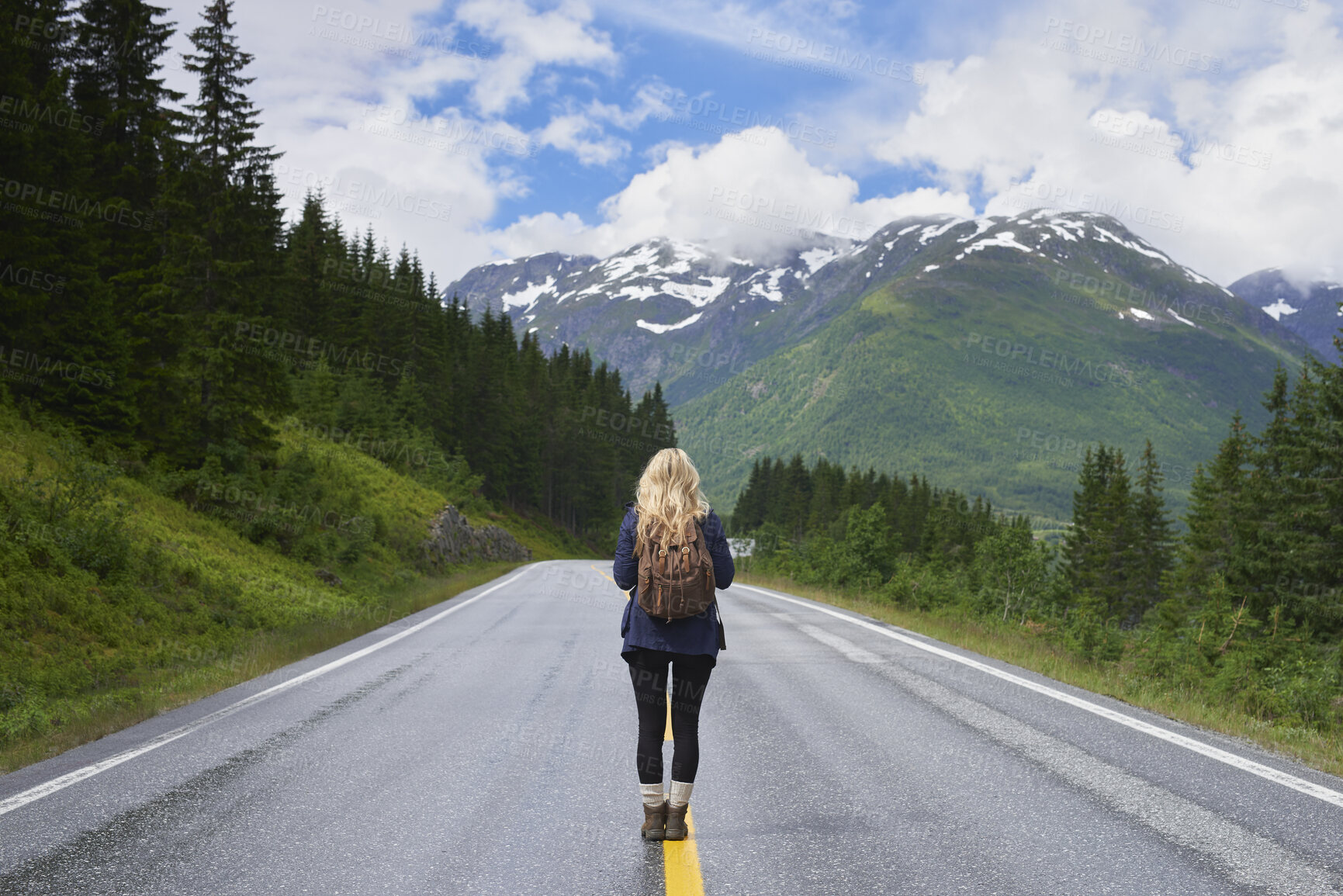 Buy stock photo Back, woman and hiking on road with mountain view, sightseeing and travel exploration for vacation. Person, backpack and adventure outdoor with scenery for winter holiday, tourist trip and wellness.