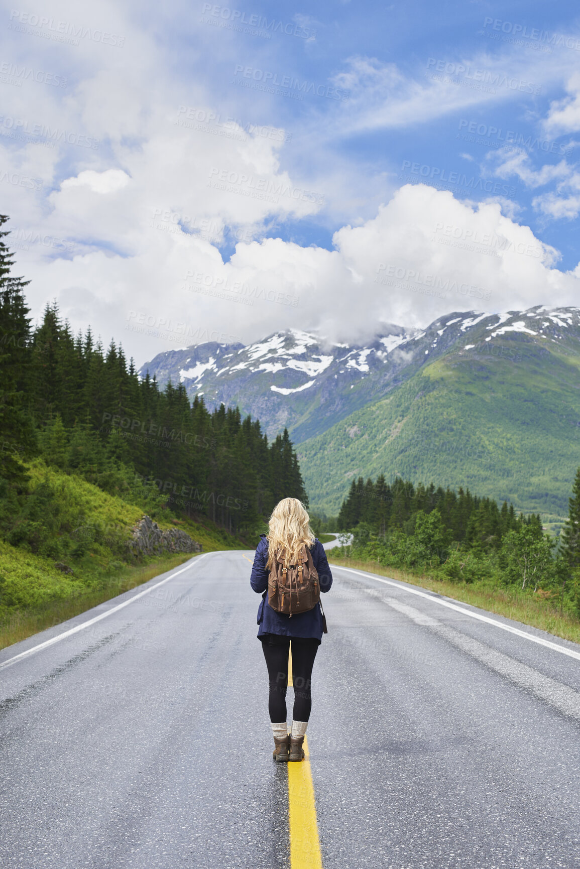Buy stock photo Back, woman and hiking on road with mountains, sightseeing trip and travel exploration for vacation. Person, backpack and adventure outdoor with scenery for winter holiday, peace or tourist trekking.