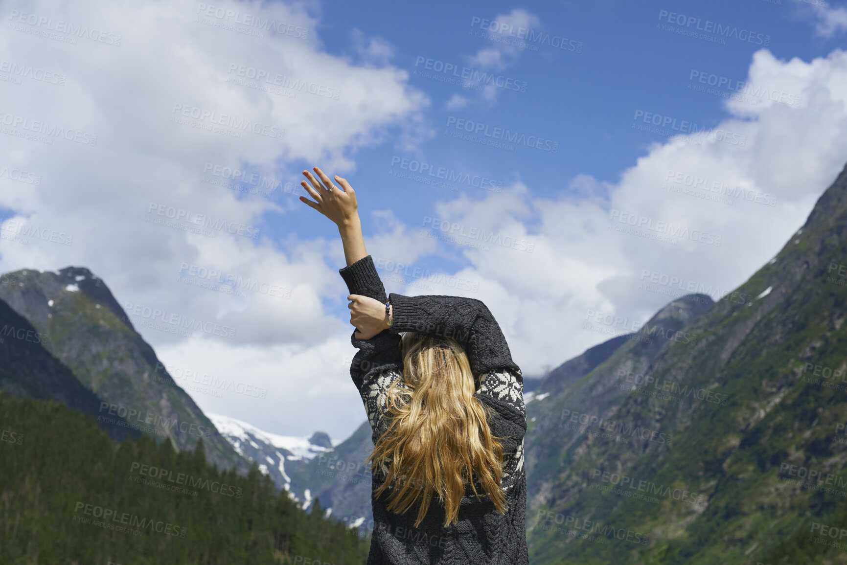 Buy stock photo Back, woman and arms up in nature with mountain view, sightseeing and travel exploration for vacation. Person, freedom and adventure outdoor with scenery for winter holiday, tourist trip and wellness