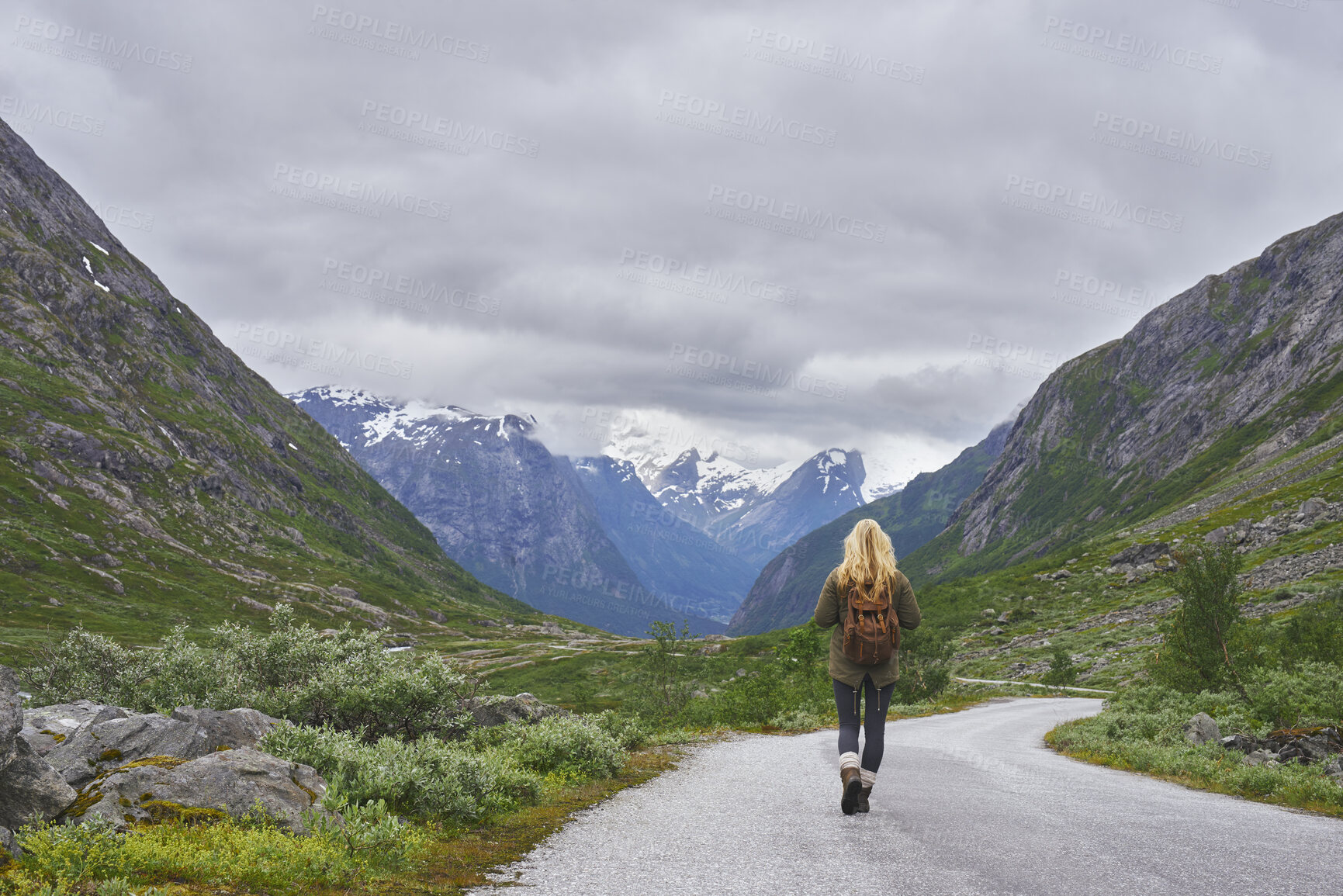 Buy stock photo Mountain, trekking and woman on road for adventure, mockup space and fresh air on journey or travel. Outdoor, person and hiking on weekend, exploration and backpacking with view of valley or scenery