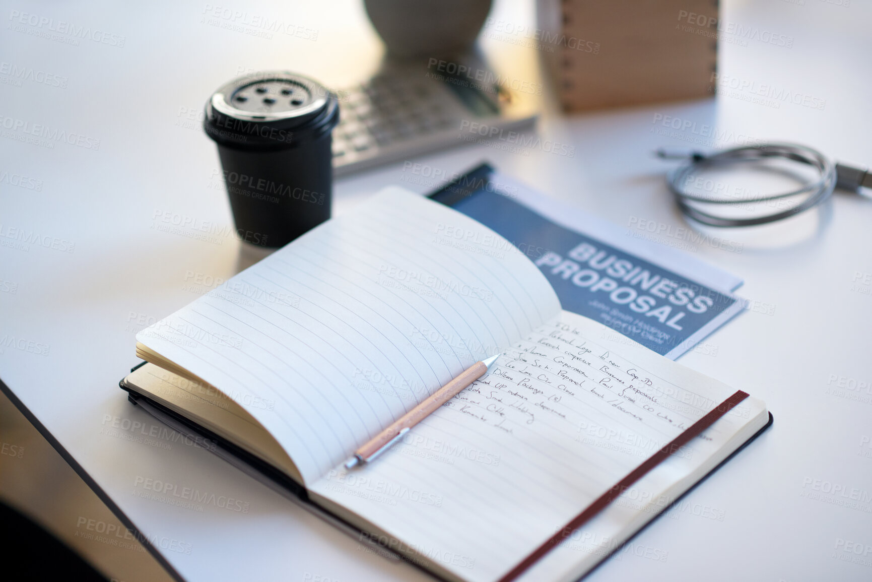 Buy stock photo Table, notebook or business proposal with coffee in office, to do list or financial planning for goals. Brainstorming notes, supplies or planner with ideas for profit growth, investment info or drink