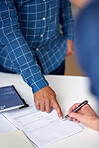 business people hands signing contract document for corporate partnership deal
