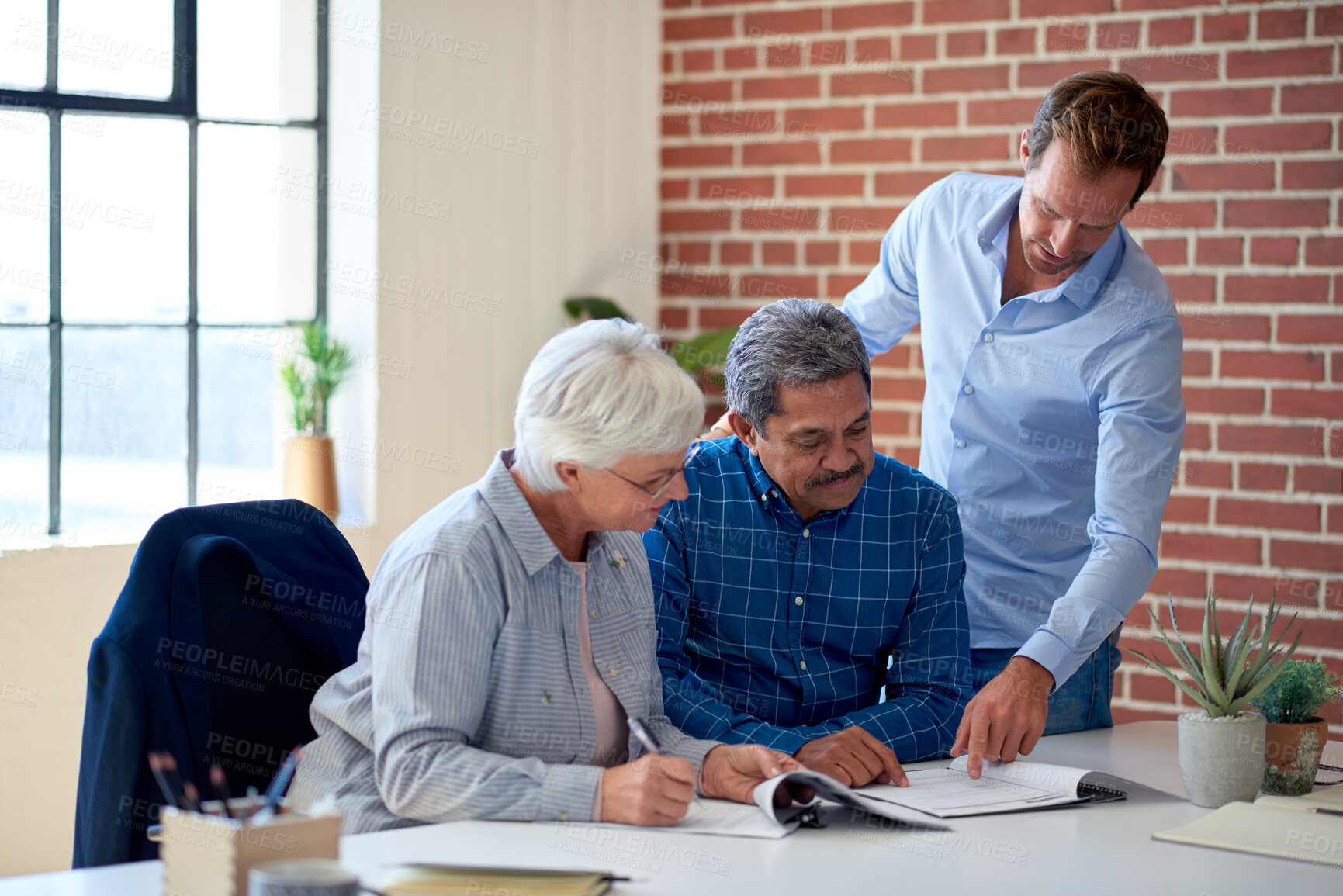 Buy stock photo Lawyer, document and senior couple in office for signature, financial contract and insurance policy. Attorney, elderly people and legal paperwork for agreement, asset management and retirement notary