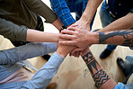 top view hands stacked group of people celebrating team building together friends sharing success