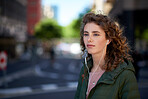 beautiful woman walking in city street listening to music wearing earphones urban lifestyle