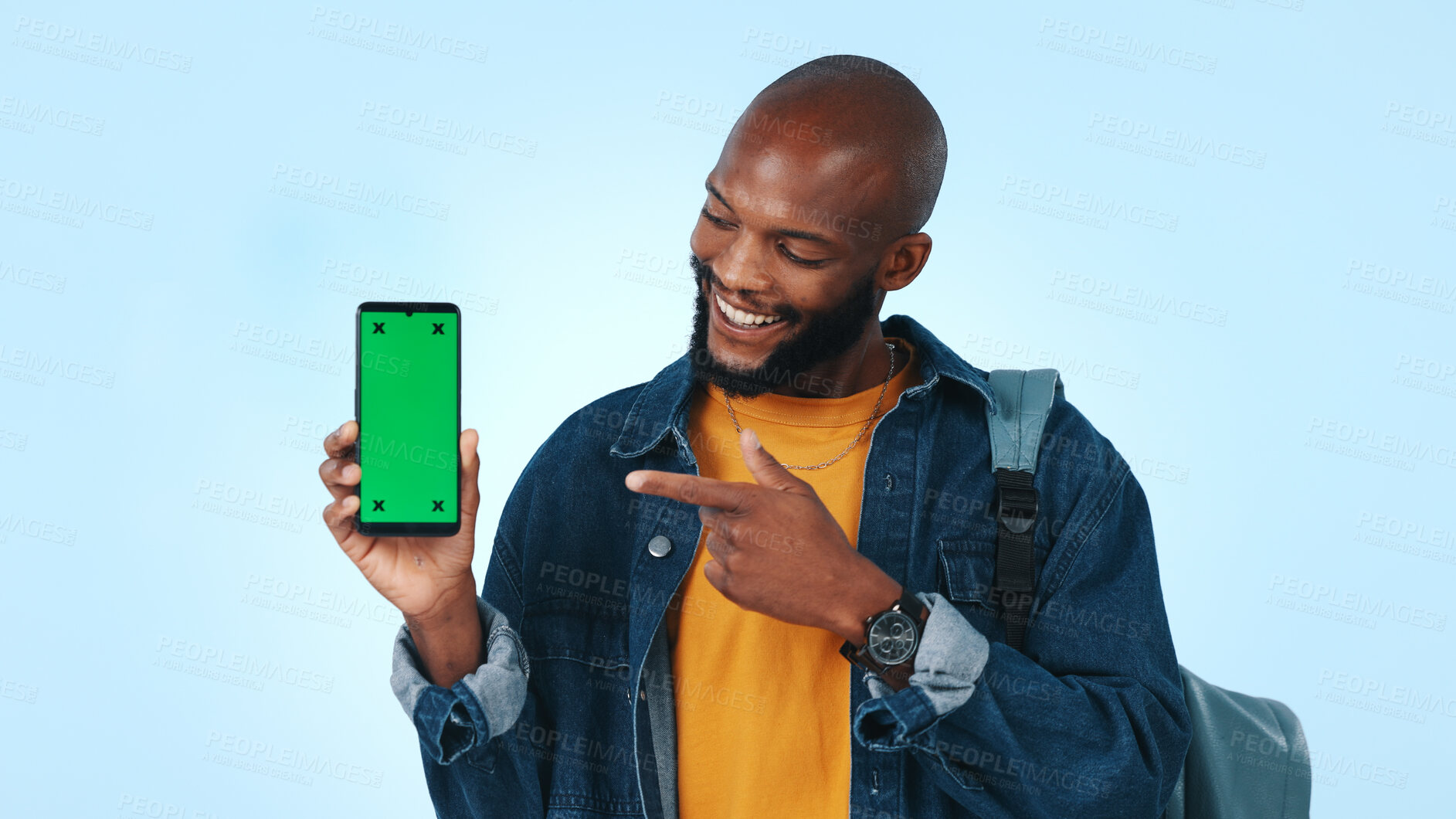 Buy stock photo Green screen, student and happy man with phone, portrait and recommendation for social media or web. Blue background, marketing and person with smile for mobile, elearning and mockup space in studio