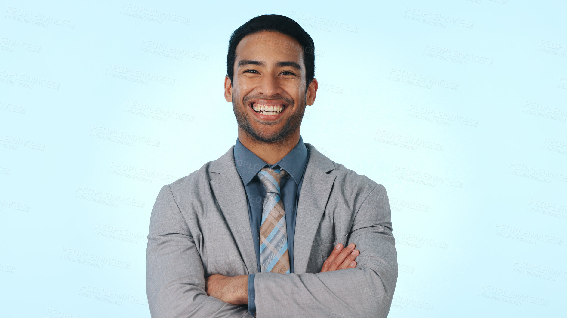 Buy stock photo Crossed arms, happy and portrait of businessman in studio with confidence for finance career growth. Smile, professional and male financial manager with pride for job opportunity on blue background.