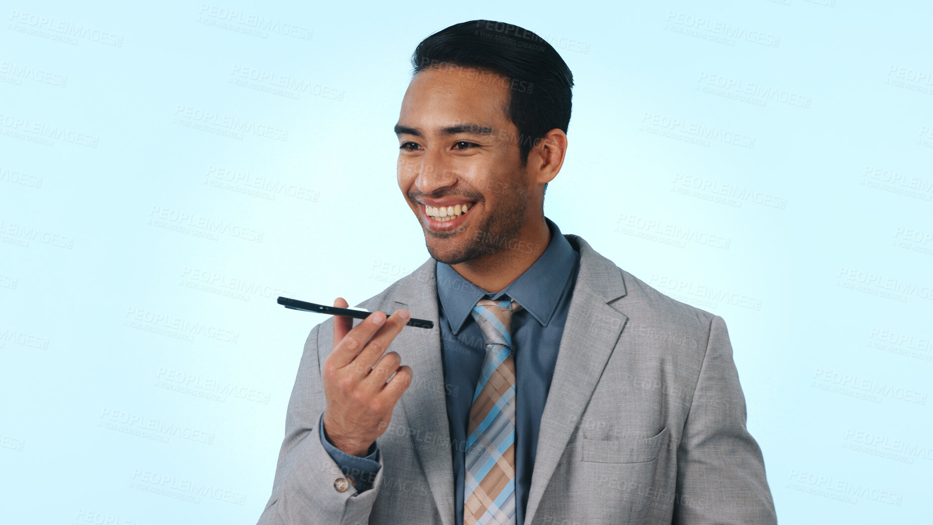 Buy stock photo Happy, businessman or studio with speaker phone for audio message or chat on a blue background. Man, employee or financial advisor talking with smile on smartphone app for communication or voice note