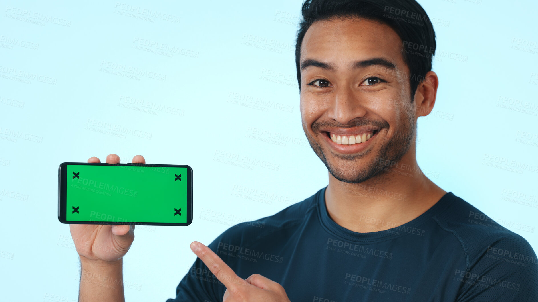 Buy stock photo Green screen, online and happy man with phone, portrait and recommendation for social media and web. Blue background, marketing and person with smile for mobile, promotion and technology in studio