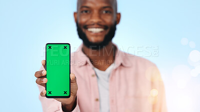 Buy stock photo Green screen, presentation and happy man with phone, portrait or recommendation for social media app. Blue background, marketing and black person with mobile display, mockup space and tech in studio