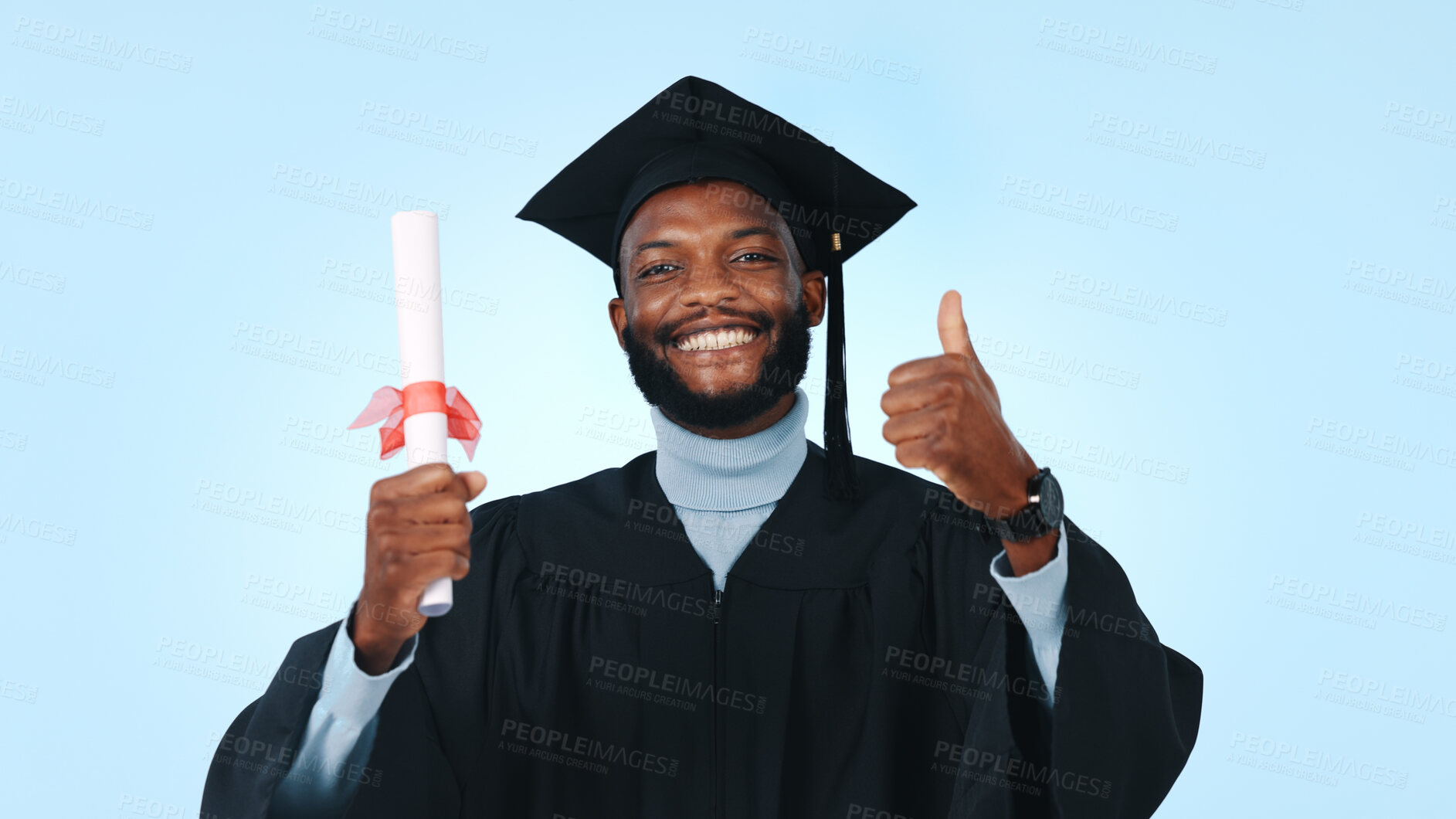Buy stock photo Graduation, black man or portrait of student with thumbs up in studio for diploma on a blue background. Male person, graduate or smile with like emoji, success or certificate for academic achievement