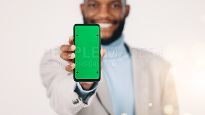 Buy stock photo Happy, businessman and phone with green screen in studio,  mockup space or marketing of banking app. Black person, smile and presentation of mobile for investment portfolio, bokeh or white background