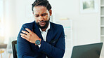 Business, black man and shoulder pain in office with bad posture, muscle strain and burnout. Person, discomfort and frustrated with joint sprain, overworked employee and injury or inflammation